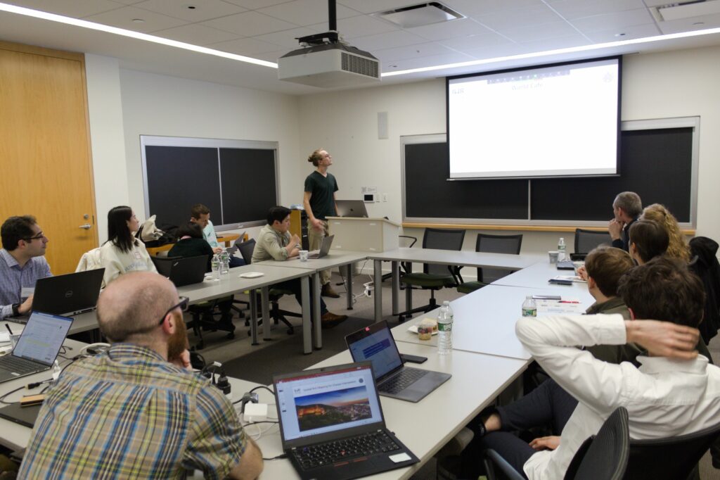 Steffen Knoblauch, a PhD student and Research Assistant at the GIScience Research Group of the Institute of Geography in Heidelberg, leads a workshop at CGS 2023.