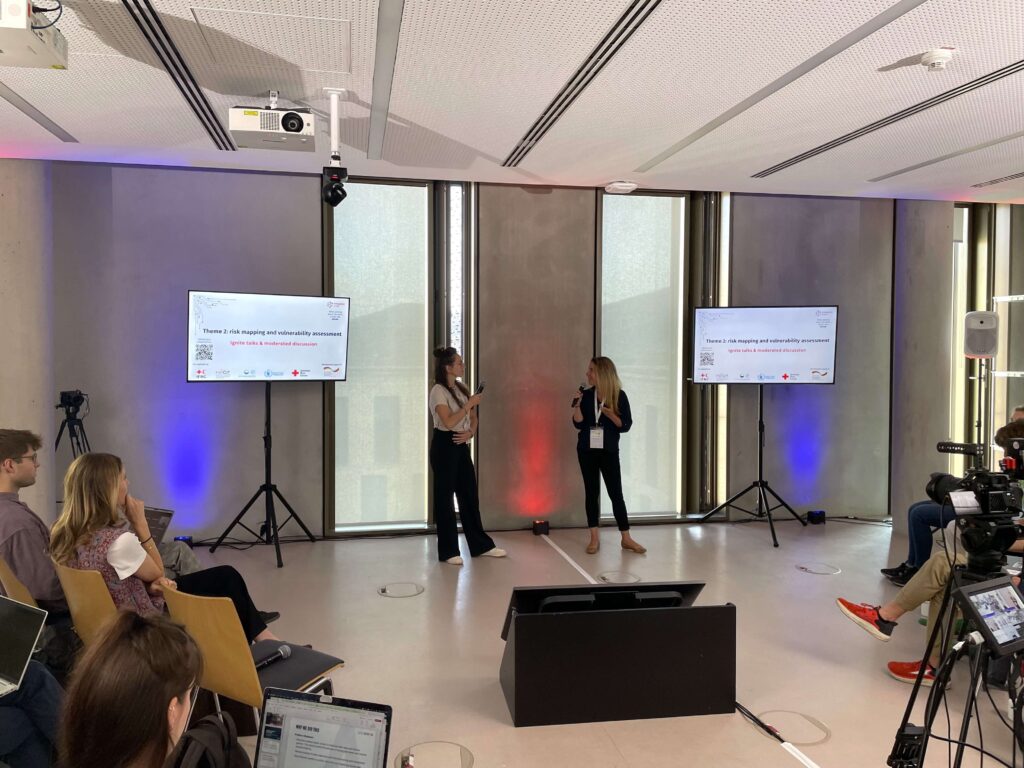 two woman giving a presentation